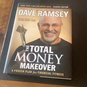 Dave Ramsey total money makeover hard back book. New condition